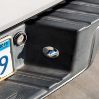 United Pacific - Chrome or Black License Plate Light Lens For 1990-2004 Ford Truck